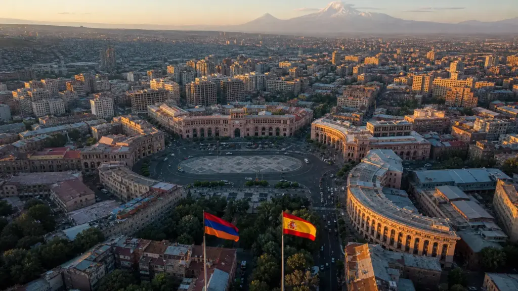 reina sofía en armenia: vista aérea de la Plaza de la República de Ereván con banderas de Armenia y España al atardecer